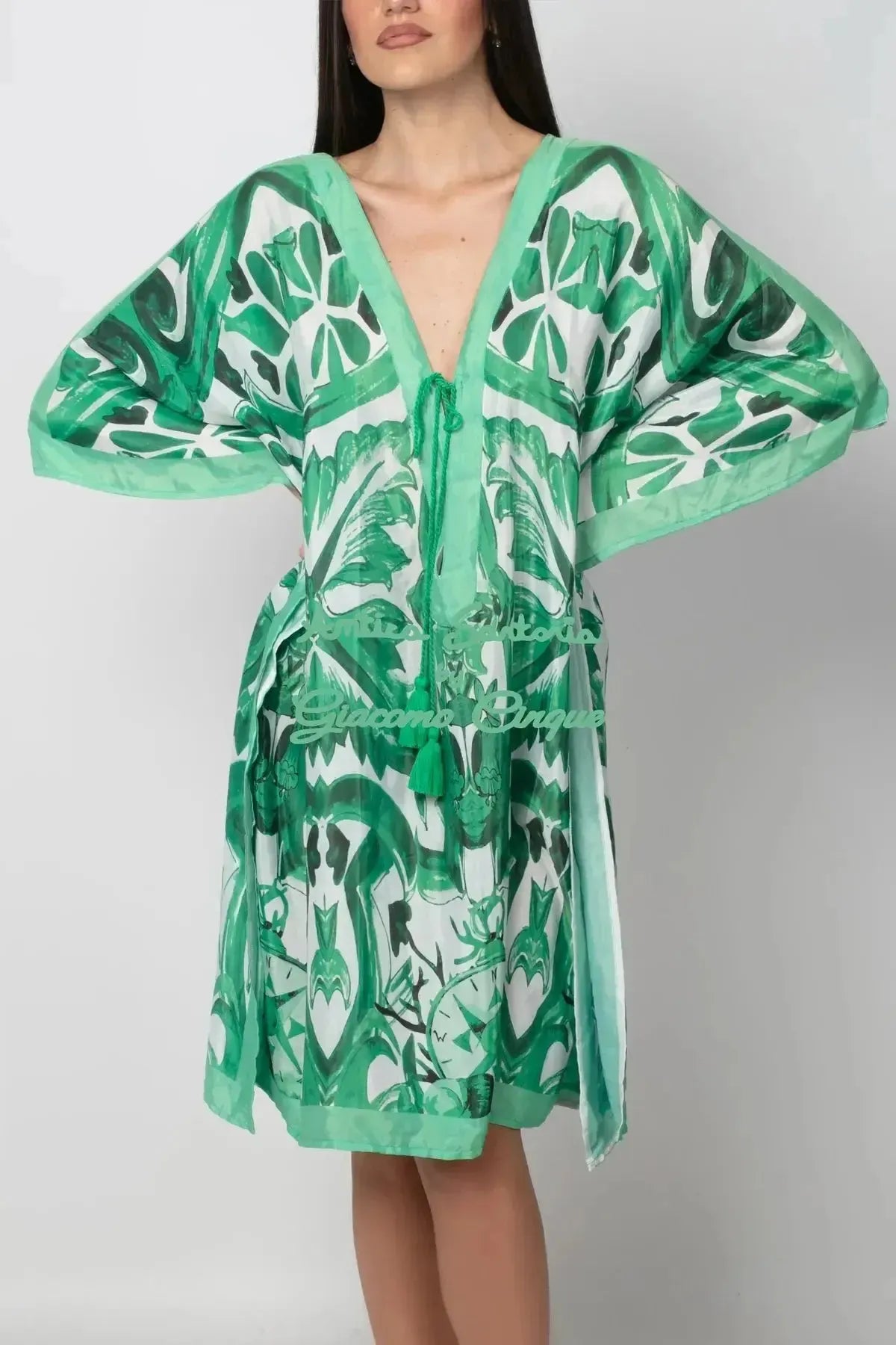 SHORT PONCHO IN GREEN